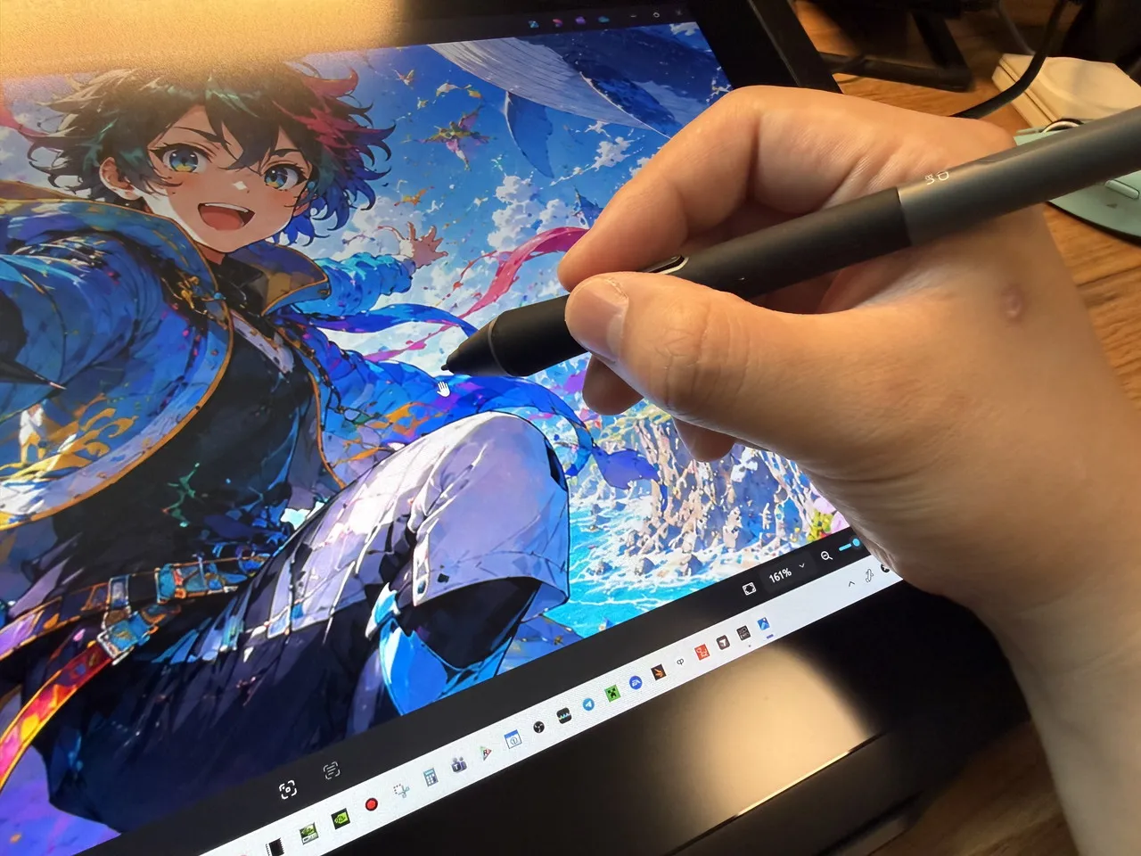 XPPen Artist 15.6 pro V2に手を載せて作業しているイメージ