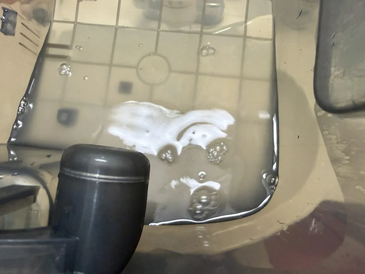 自動洗浄後の汚水